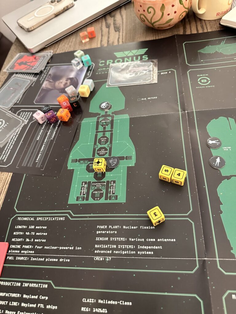 Tabletop with Alien RPG components on it, mid-game.