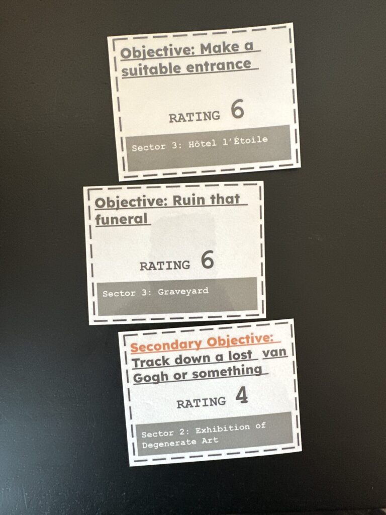 Self made Objective cards for the game. I put them together in Google Slides, printed out, and laminated.